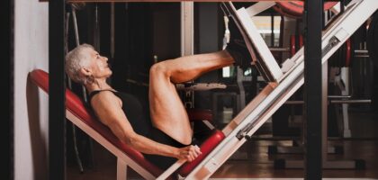 Woman doing leg press at gym