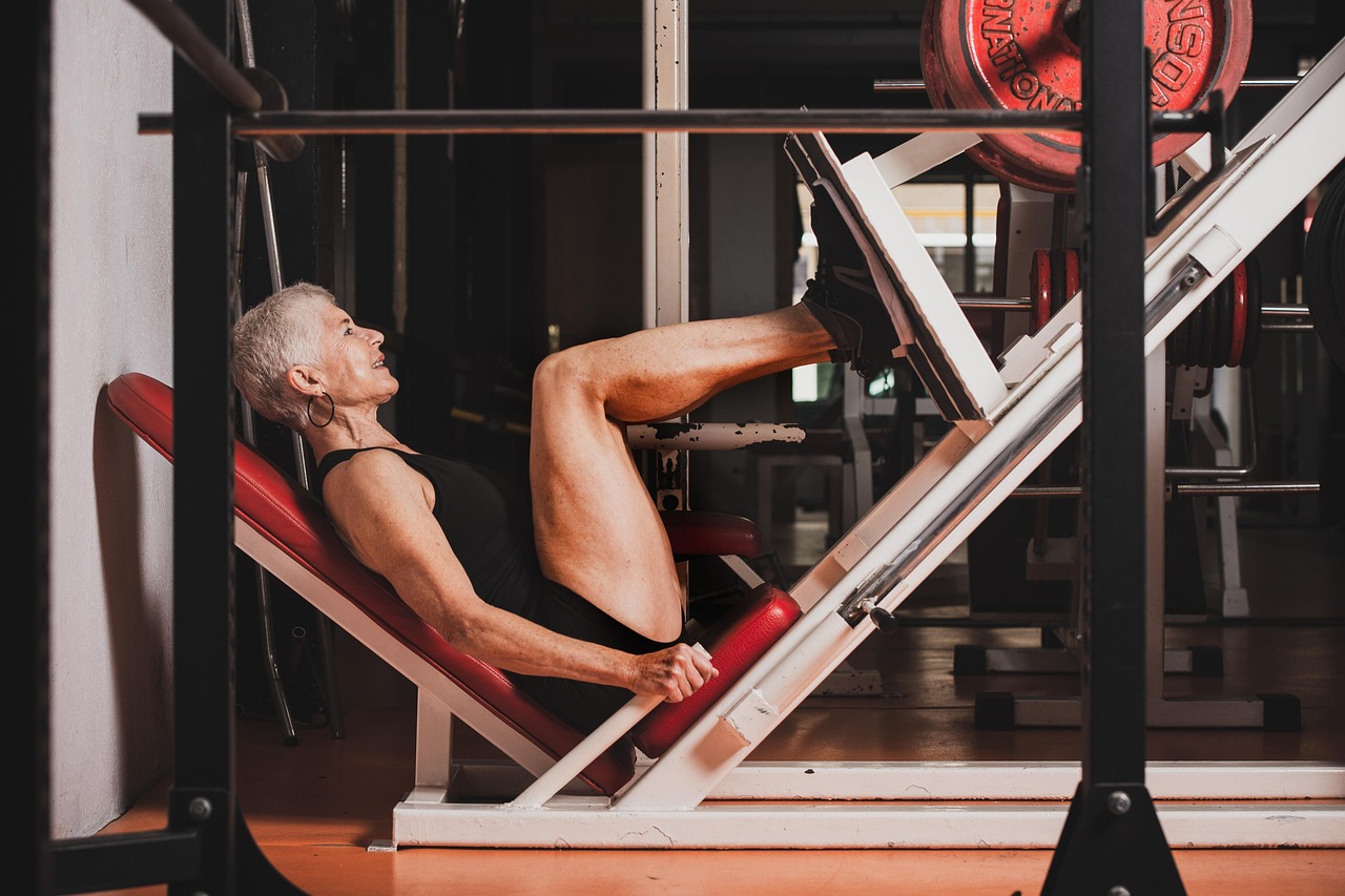 Woman doing leg press at gym