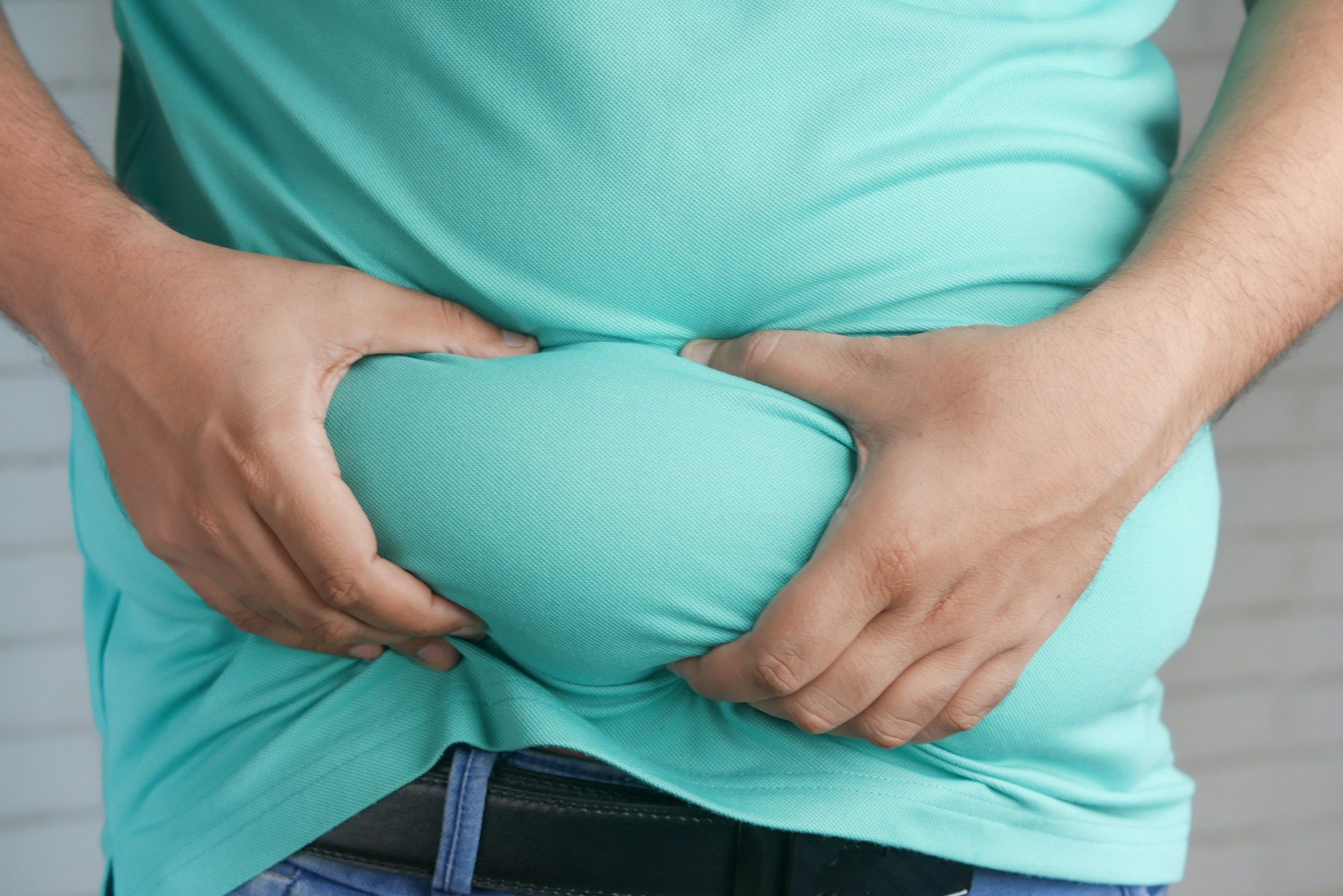Midsection close-up representing belly fat loss goals after 40