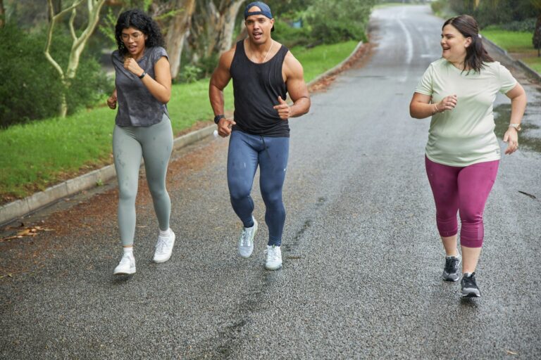 Three people jogging outdoors to balance HIIT vs LISS for insulin resistance and metabolic health